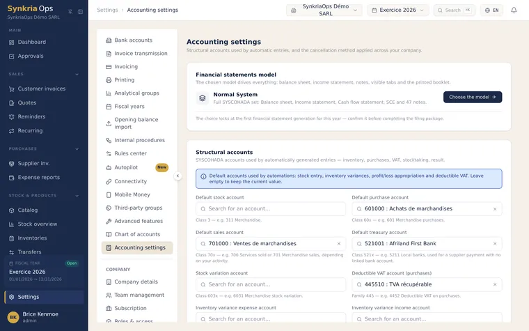 SynkriaOps Accounting settings page: Système Normal financial-statement model and SYSCOHADA structural accounts (stock, purchase, sale, cash, deductible VAT).